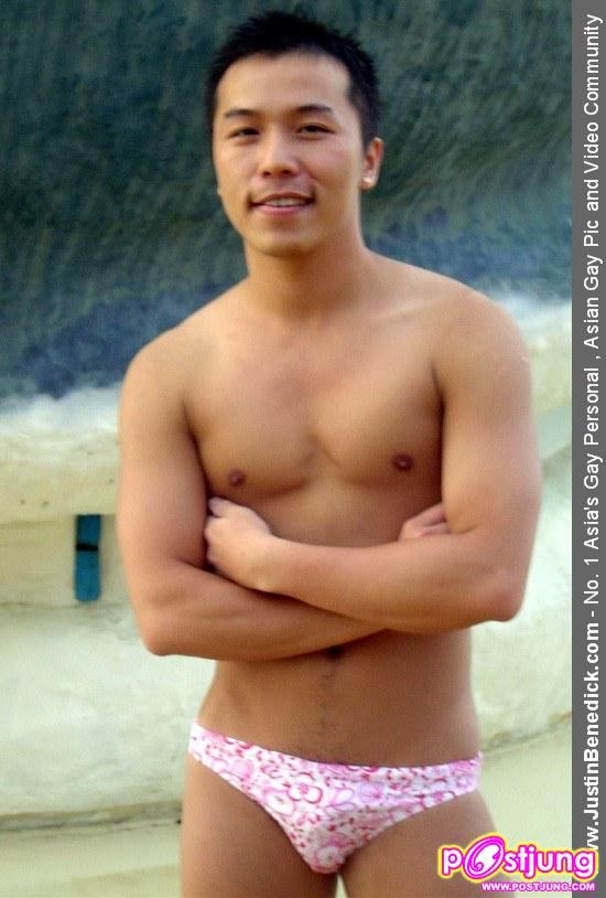 Asian guy posing in playgirl